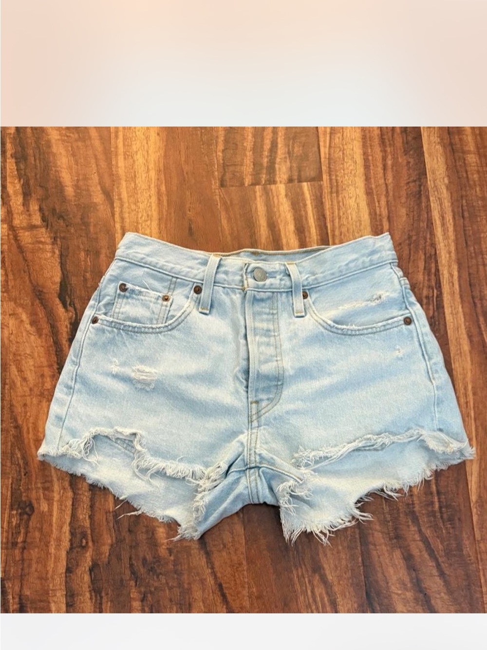 Levi’s Light Wash Distressed High-Rise Denim Shorts